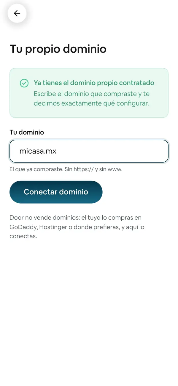 El aviso verde «Ya tienes el dominio propio contratado», el campo Tu dominio con «micasa.mx» y el botón Conectar dominio